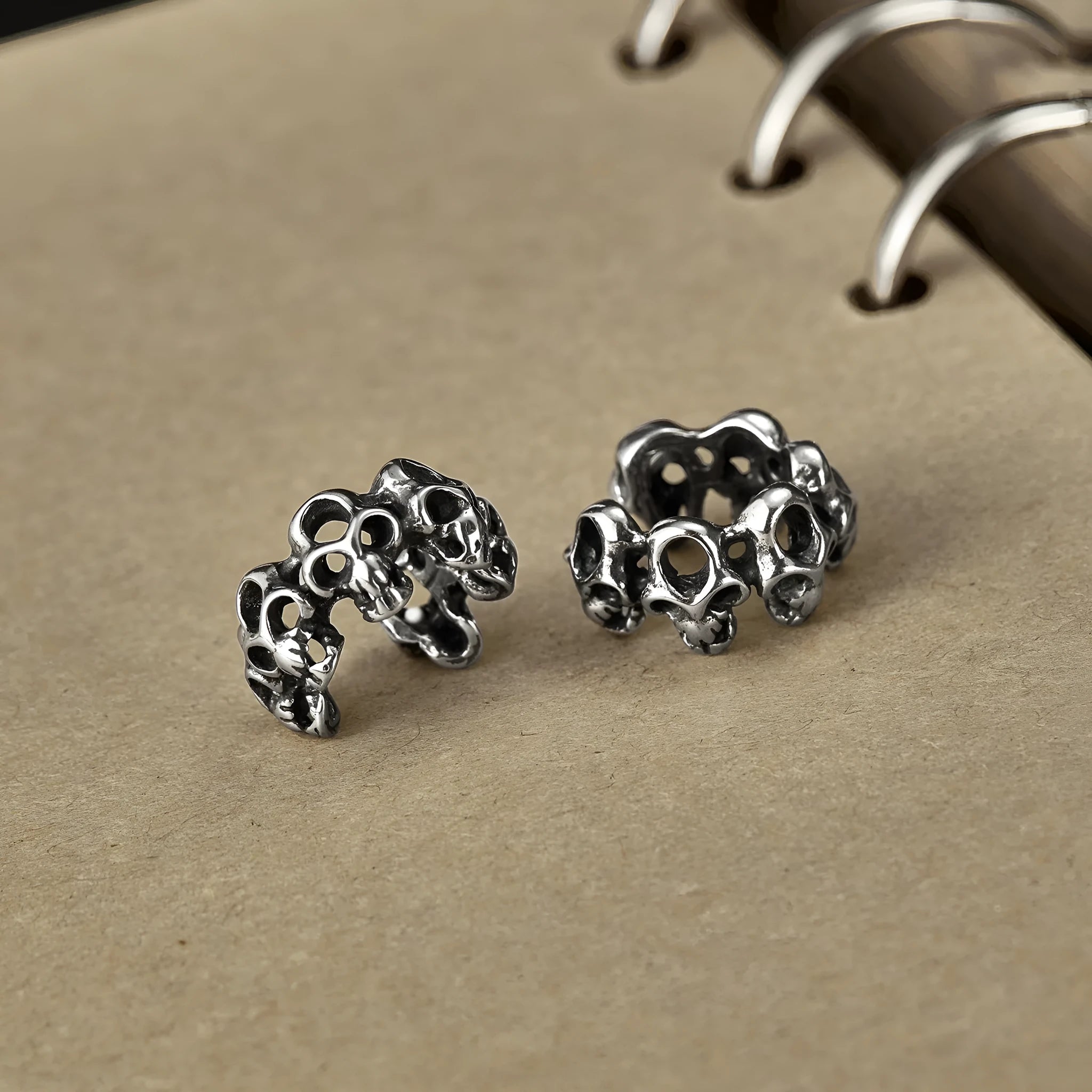 Retro hollow skull stainless steel clip earrings with geometry design