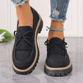 Women's black loafers with tassel detail and bowknot on chunky heel