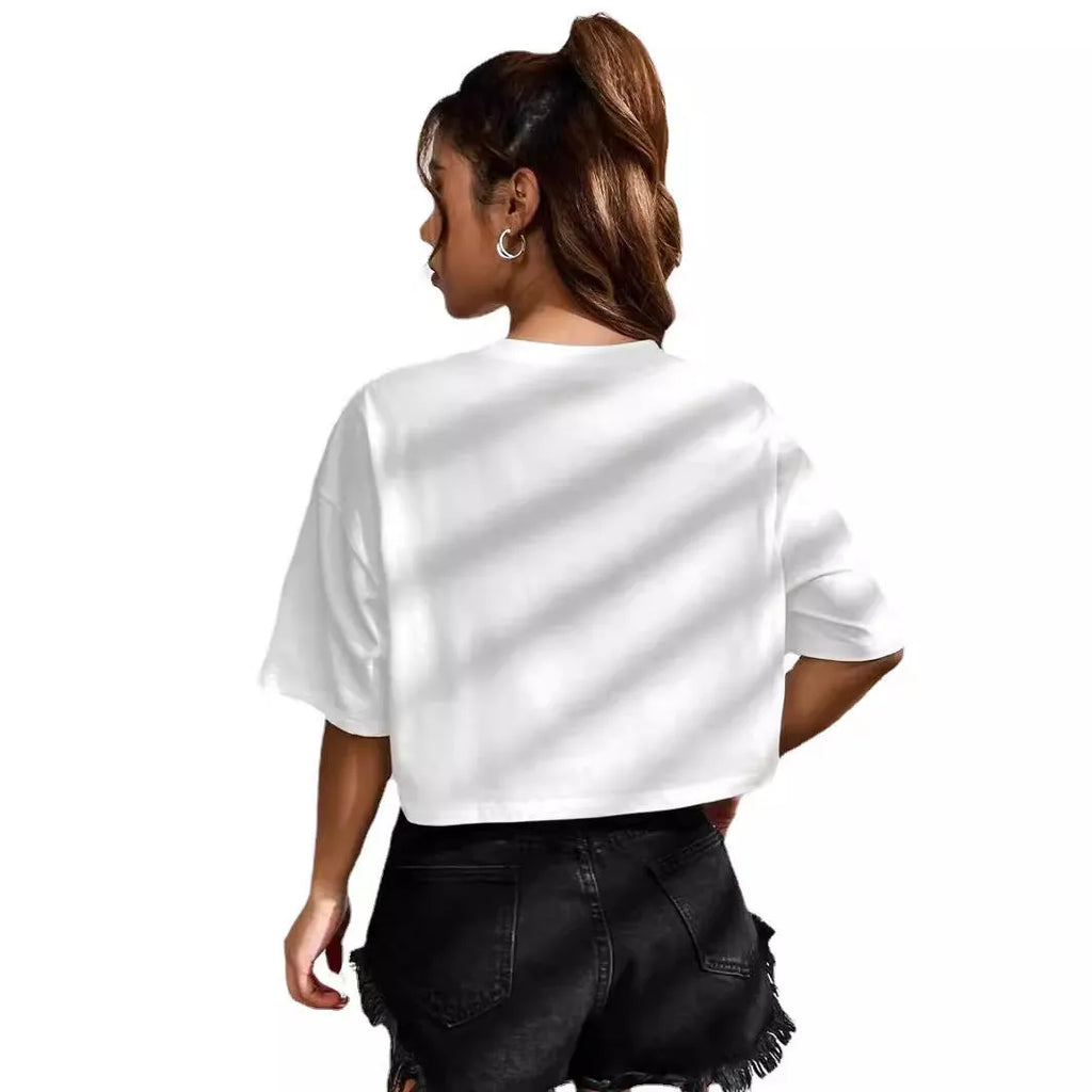 A loose-fit black cotton t-shirt with printed white English letters and an exposed navel design.