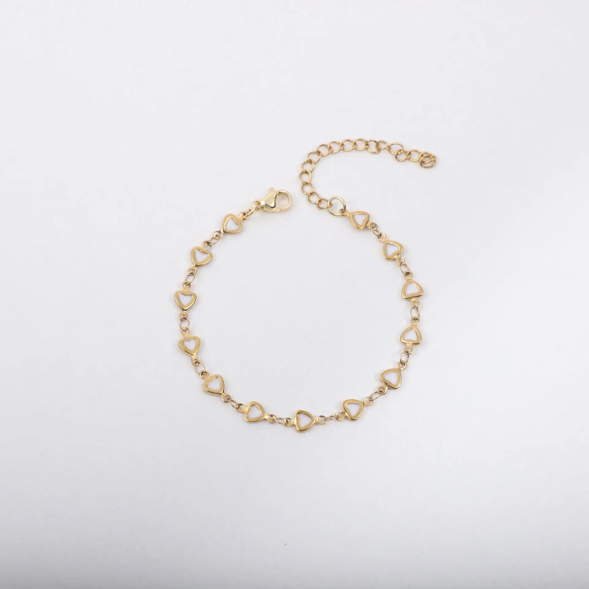Stainless steel bracelet with heart design and 18K gold colour finish in multiple colour options