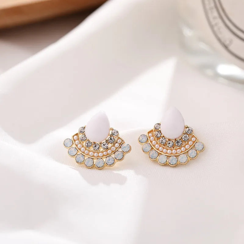 Women's silver retro fan-shaped drop earrings with opal and rhinestone geometric details.