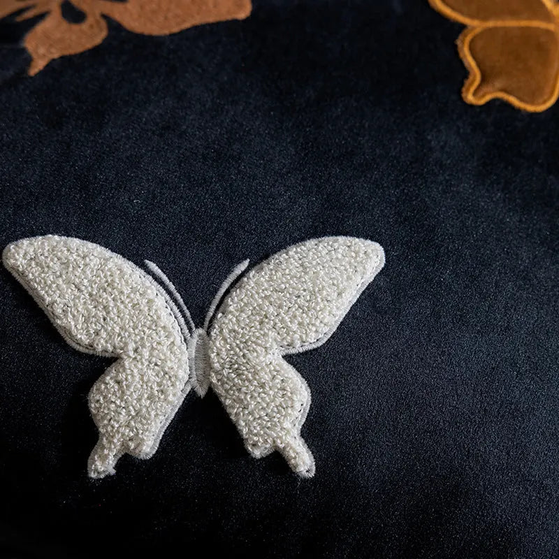 Square beige cushion with embroidered black butterfly in Chinese style pattern