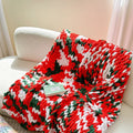 Thick striped chenille winter blanket laid flat, showing its 130x170cm size and handmade ice bar dyed pattern.