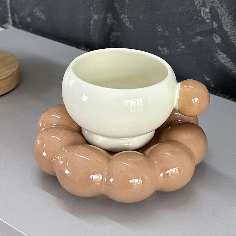 Nordic style ceramic coffee set with a 250ml cup and matching dish on a table.