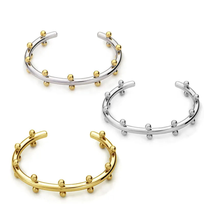 Stainless steel C-shaped bracelet with rivet-shaped bean beads and personality texture in three colour options