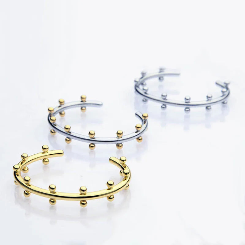 Stainless steel C-shaped bracelet with rivet-shaped bean beads and personality texture in three colour options