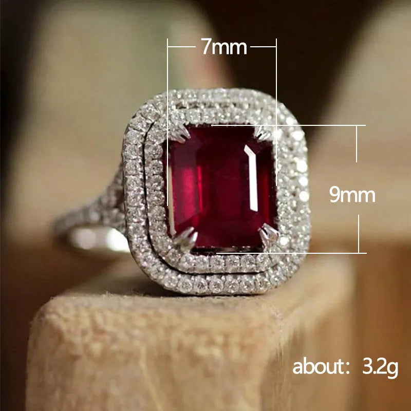 Copper women's ring with square red rhinestone on geometric princess-shaped band