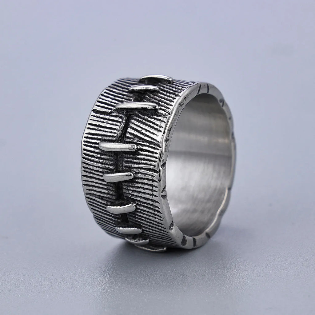 A geometric U-shaped titanium steel punk ring with a double ring design in a retro dark colour.