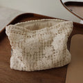 Handmade corduroy cosmetic bag with crocheted hollow flower pattern and ethnic embroidery in rope colour