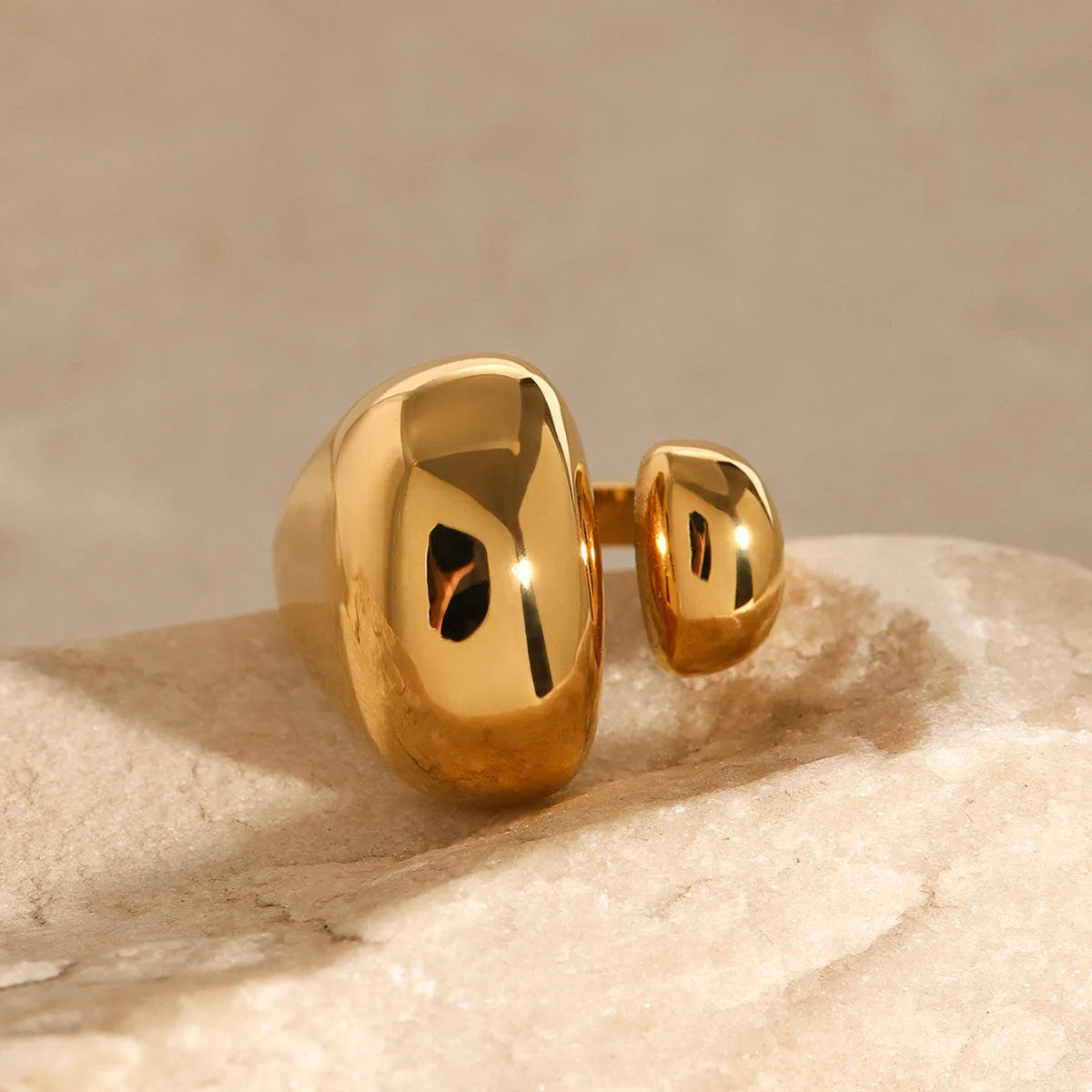 Geometric open ring in electroplated stainless steel with exaggerated European-American design