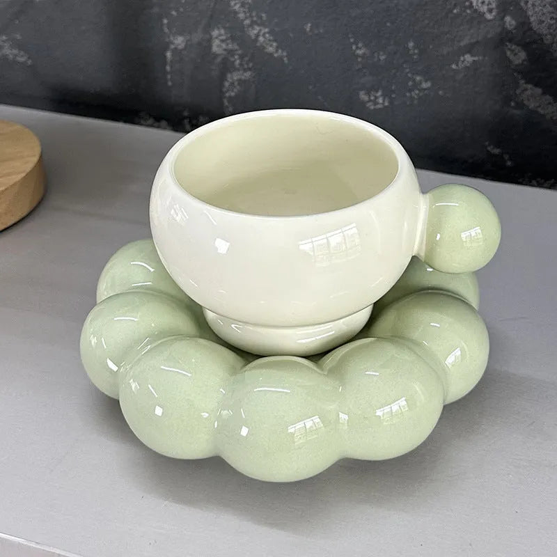 Nordic style ceramic coffee set with a 250ml cup and matching dish on a table.