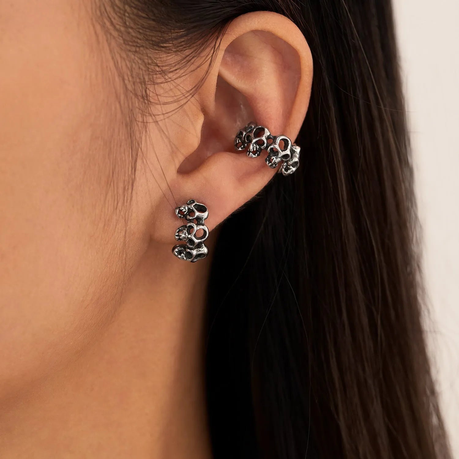 Retro hollow skull stainless steel clip earrings with geometry design