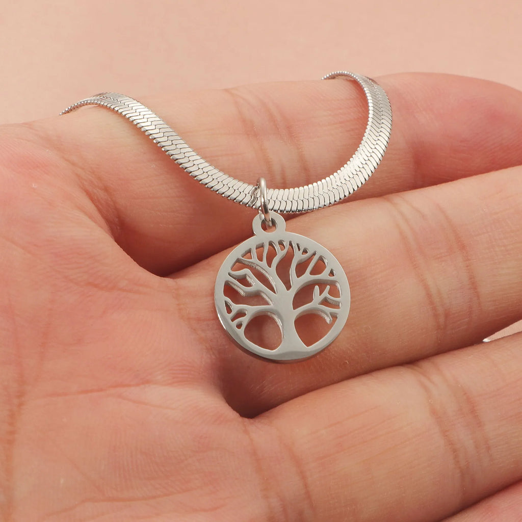 Stainless steel necklace with tree pendant on snake bone chain in gold or steel colour.