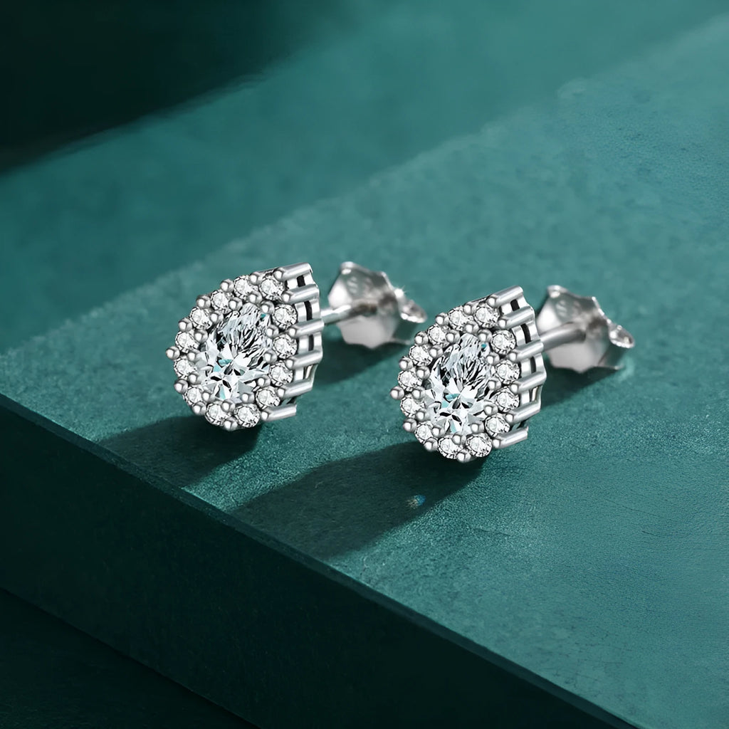 Women's sterling silver drop earrings with water drop shape and diamond treatment