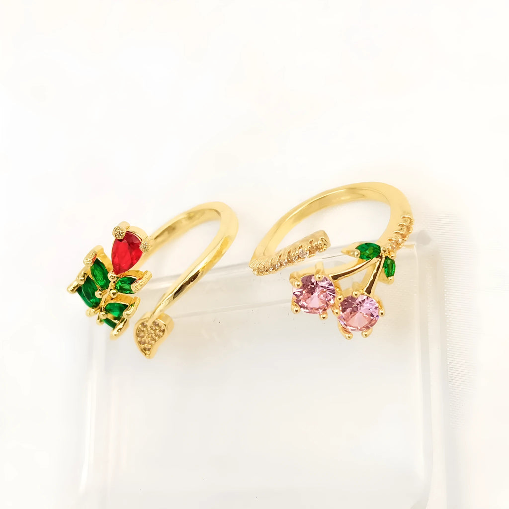 Women's geometric open ring with gold-plated copper construction, leaf design, and zircon crystal accents