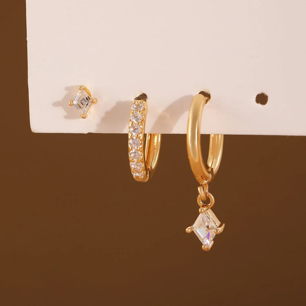 Ladies three-piece earring set with geometric zircon designs in gold and white colours