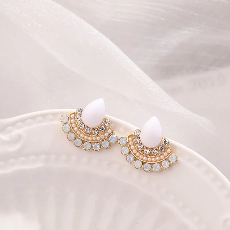 Women's silver retro fan-shaped drop earrings with opal and rhinestone geometric details.