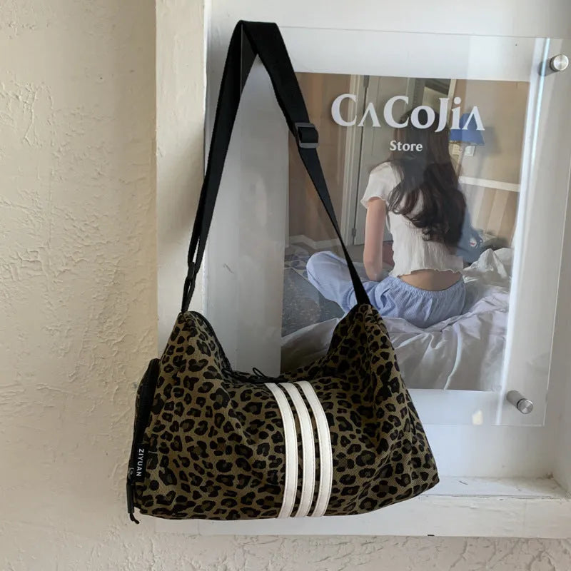 Leopard print sports style cross-body messenger bag with large capacity and shoulder strap