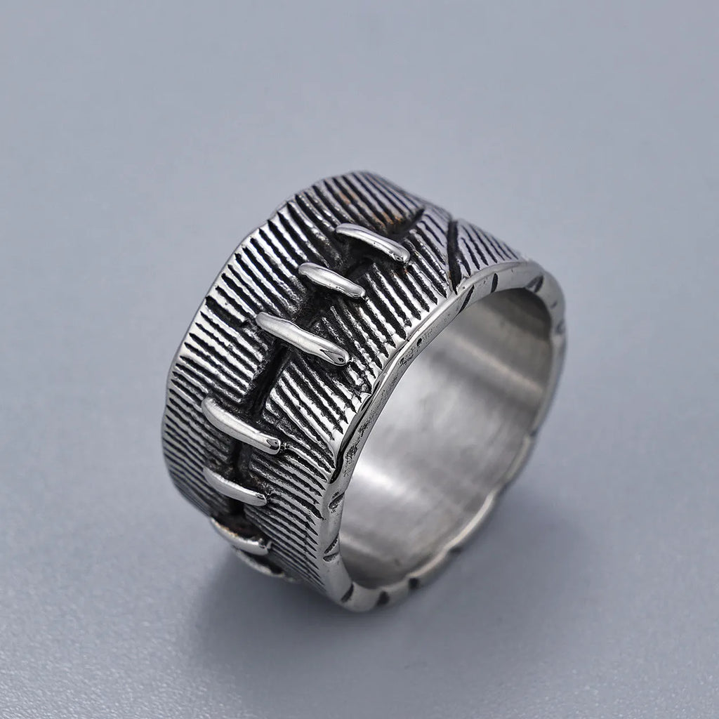 A geometric U-shaped titanium steel punk ring with a double ring design in a retro dark colour.