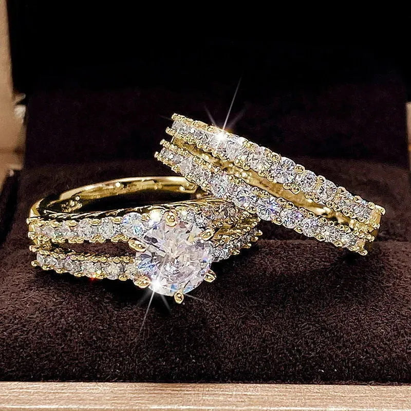 Two geometric women's rings with fully jewelled bands and round cut accents, shown in gold, rose gold, and silver colour options.