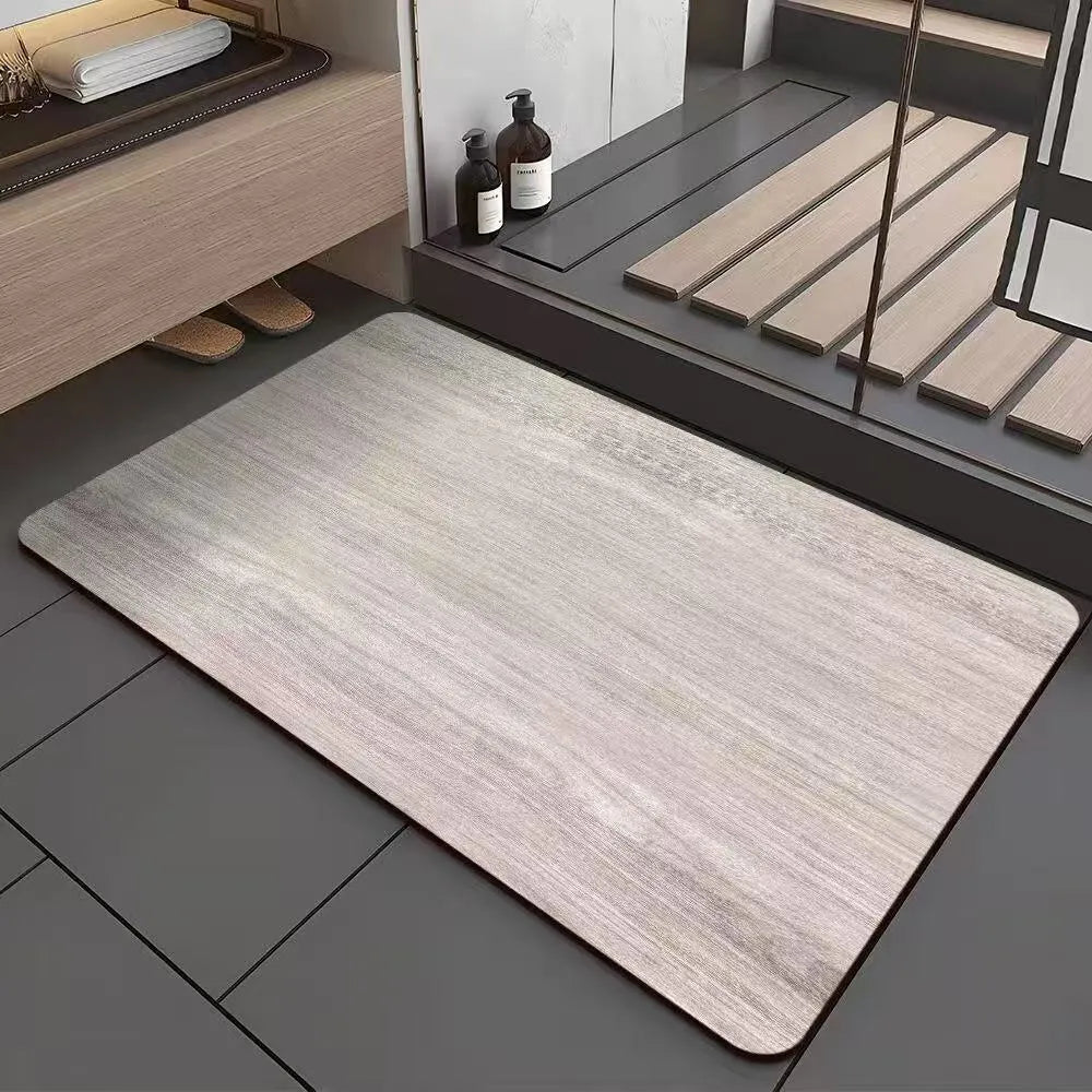 Square American style wood grain patterned diatom ooze bathroom floor mat on a tiled floor.
