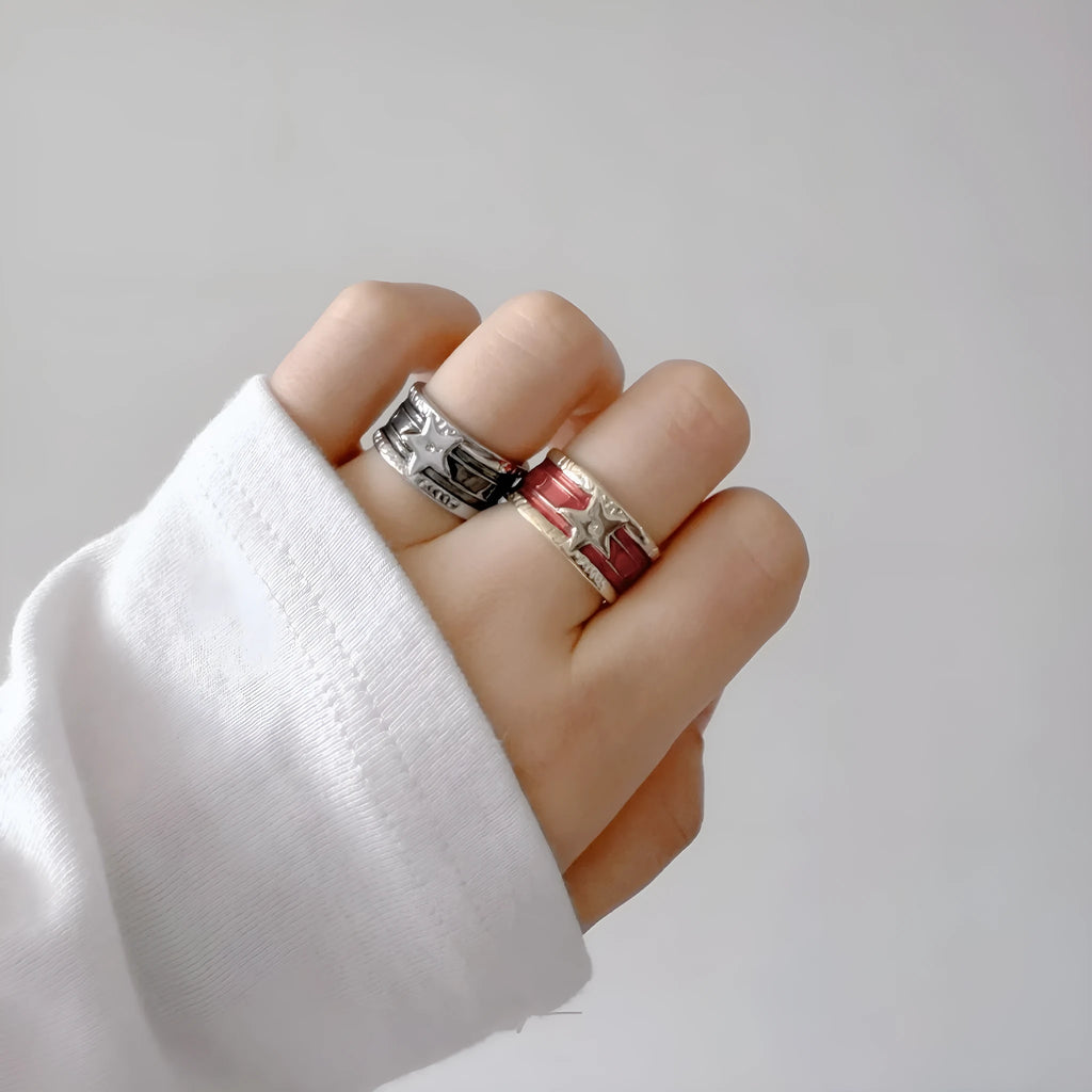 Adjustable copper ring with XINGX drop oil geometric design and distressed retro finish.