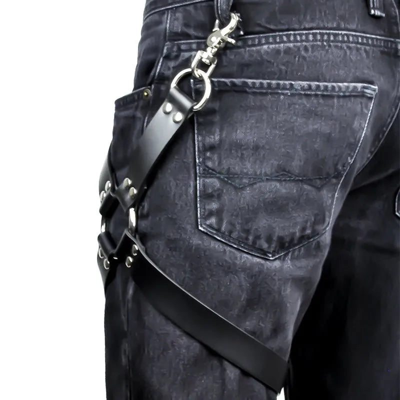 A pair of black leggings made from glossy PU leather, shown laid flat.