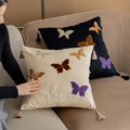 Square beige cushion with embroidered black butterfly in Chinese style pattern