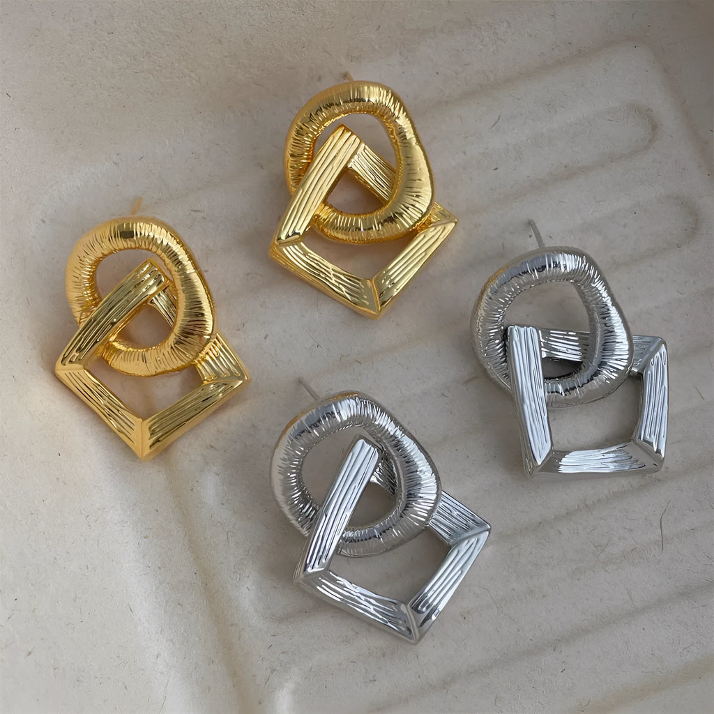 Retro geometric circle pendant earrings in gold or silver finish with 3.4cm drop length