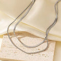 Geometric double-layer twist necklace with adjustable stainless steel snake bones chain