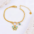 Gold tone epoxy butterfly necklace and bracelet set with snake bone chain.