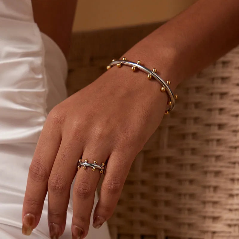 Stainless steel C-shaped bracelet with rivet-shaped bean beads and personality texture in three colour options