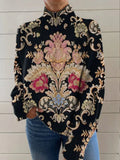 Black 3D pattern loose fit turtleneck long sleeve sweater on a hanger