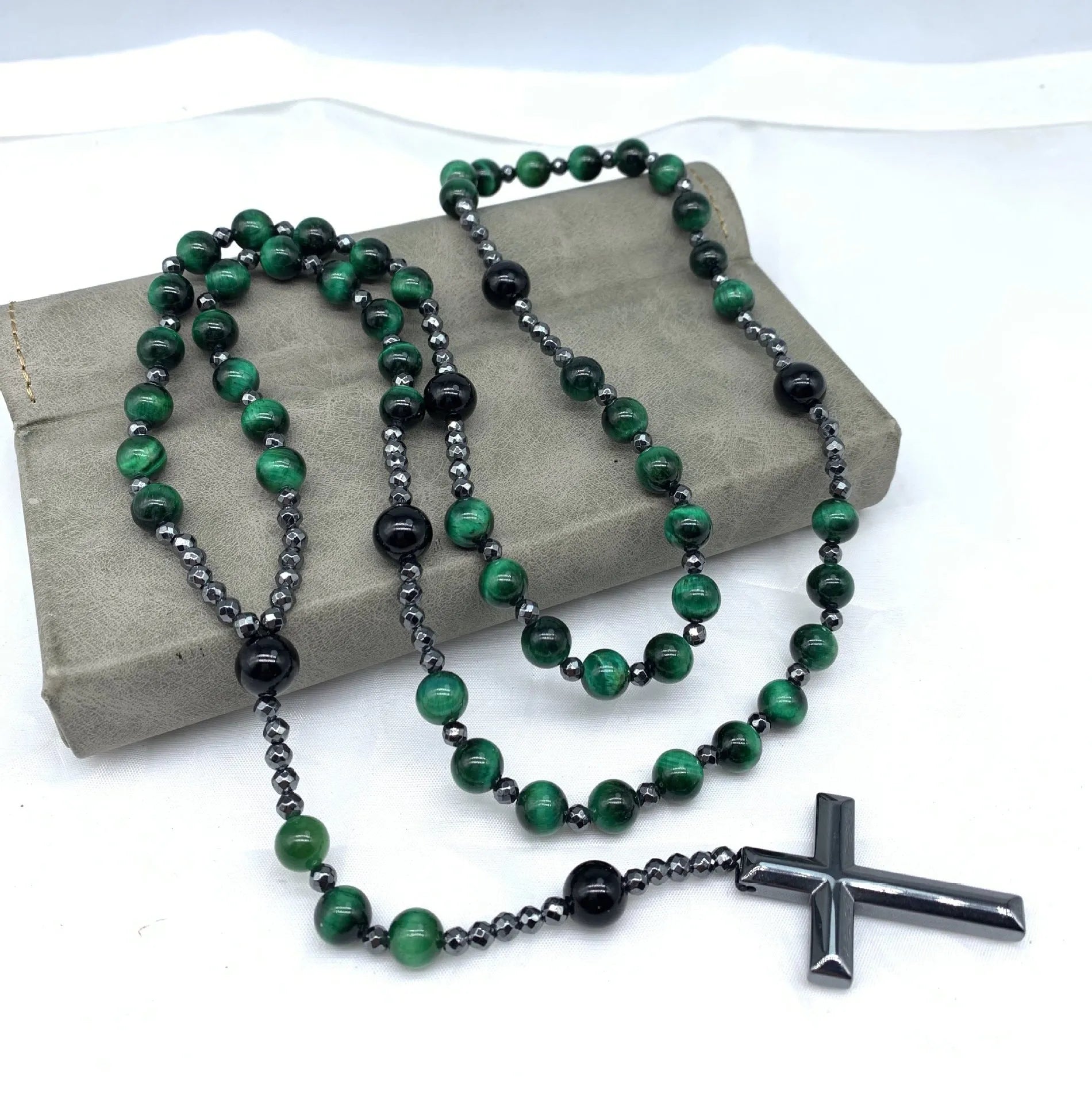 Men's stone cross pendant necklace with hand-woven detail on an 80cm ball bead chain.