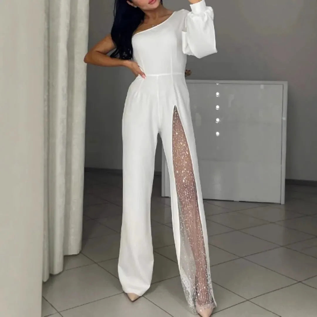 Women's black jumpsuit with an oblique asymmetric shoulder cut and a high slit on the leg.