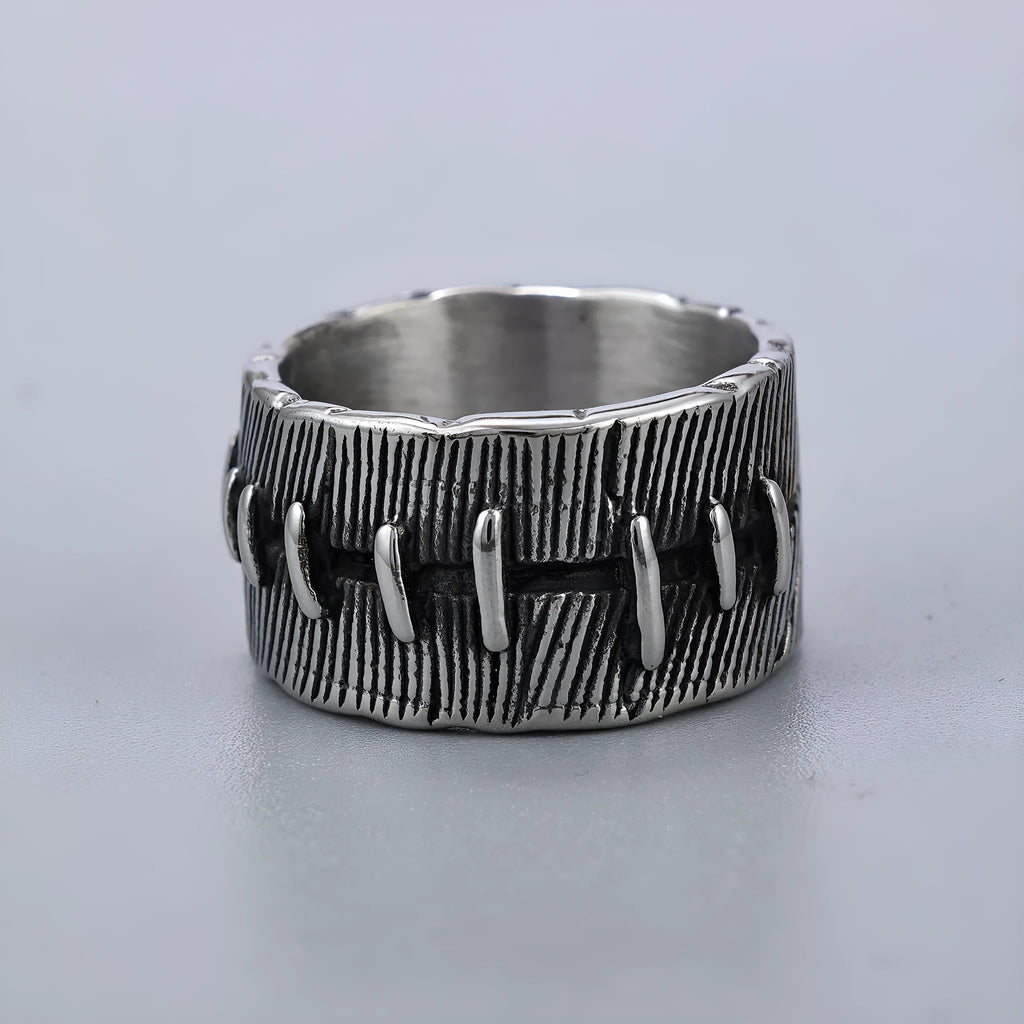 A geometric U-shaped titanium steel punk ring with a double ring design in a retro dark colour.