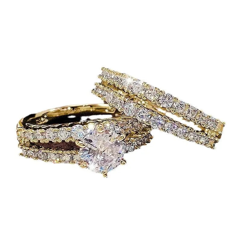 Two geometric women's rings with fully jewelled bands and round cut accents, shown in gold, rose gold, and silver colour options.