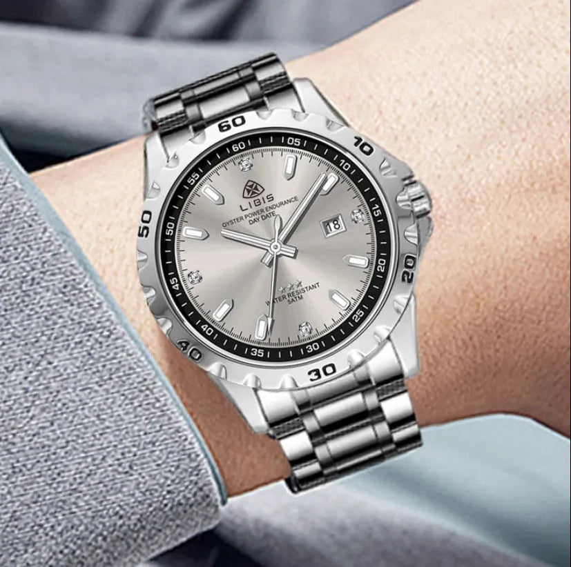 Silver men's business watch with stainless steel strap and luminous hands on black dial