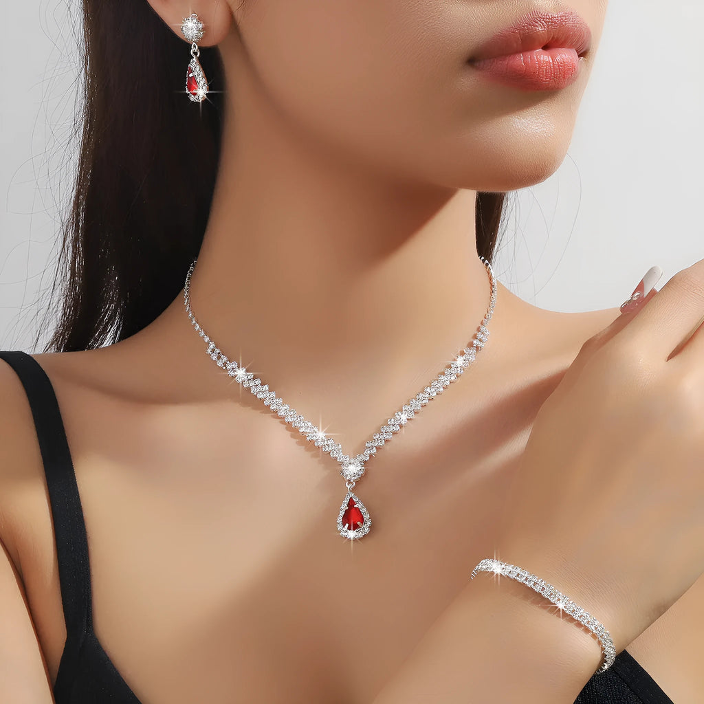 Women's claw chain necklace and earrings set with water drop rhinestones in multiple colour options