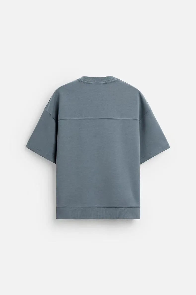 Short sleeve top and matching shorts set with double-sided cloth texture in urban style