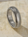 Women's titanium steel elastic bracelet with exaggerated vertical stripe pattern in gold finish