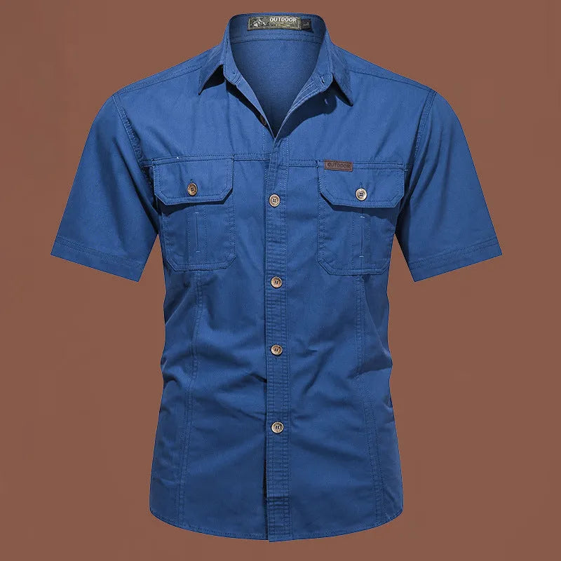Men's loose fit cotton short sleeve work shirt in cardigan style on a hanger