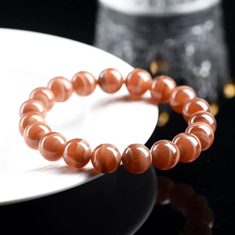 Natural Old Mine Rhodochrosite round beads bracelet from Peru with geometric design