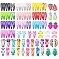 Assorted metal snap hair clips in bright colours showing animal, fruit, crown and star designs