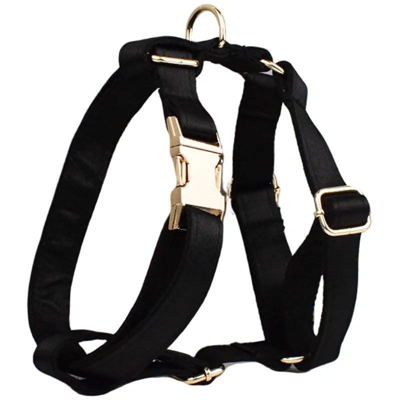 Fabric dog collar and lead set with matching chest strap vest and decorative bow tie.