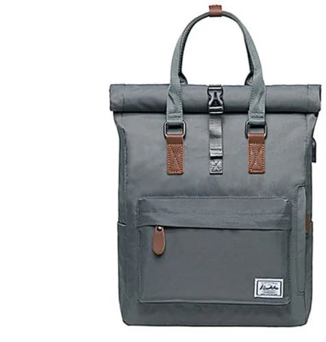 Casual black polyester backpack with cover opening showing internal computer pocket and zipper compartment