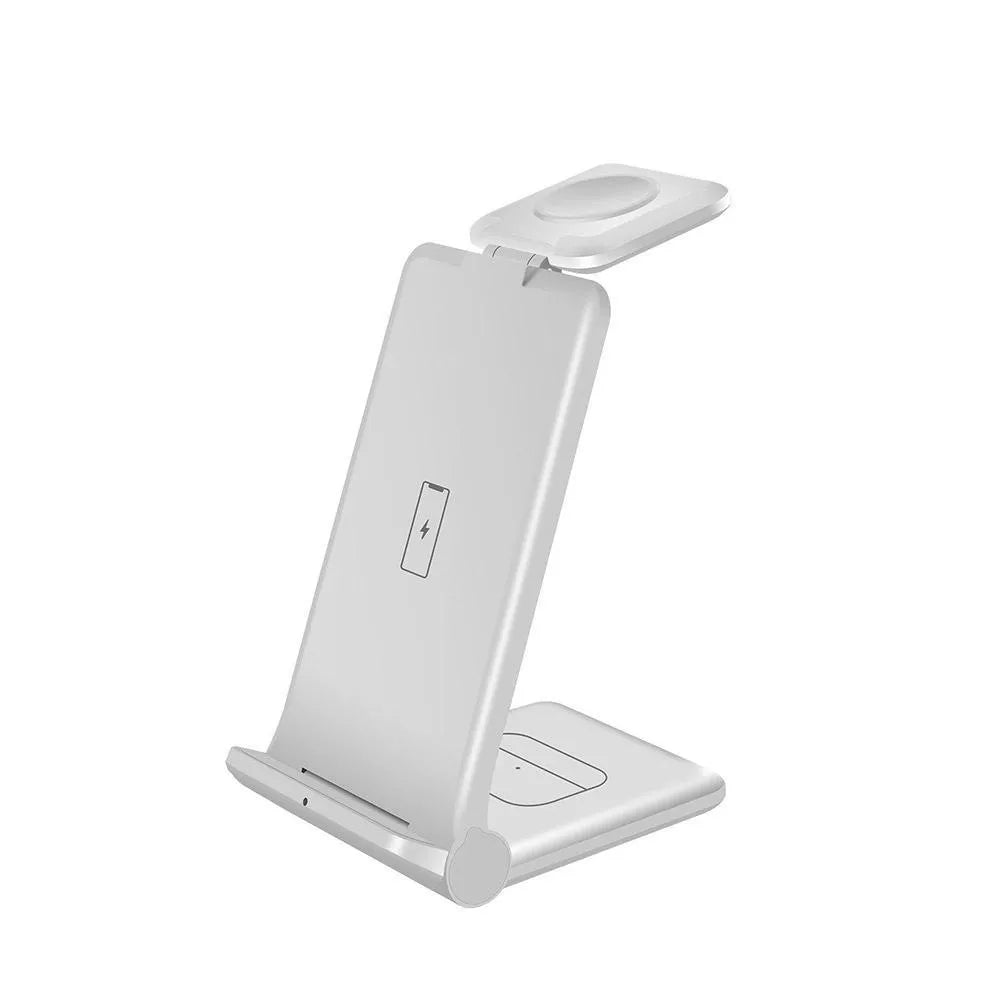 White 3-in-1 wireless charging station holding an iPhone upright, with an Apple Watch and AirPods on charging pads.