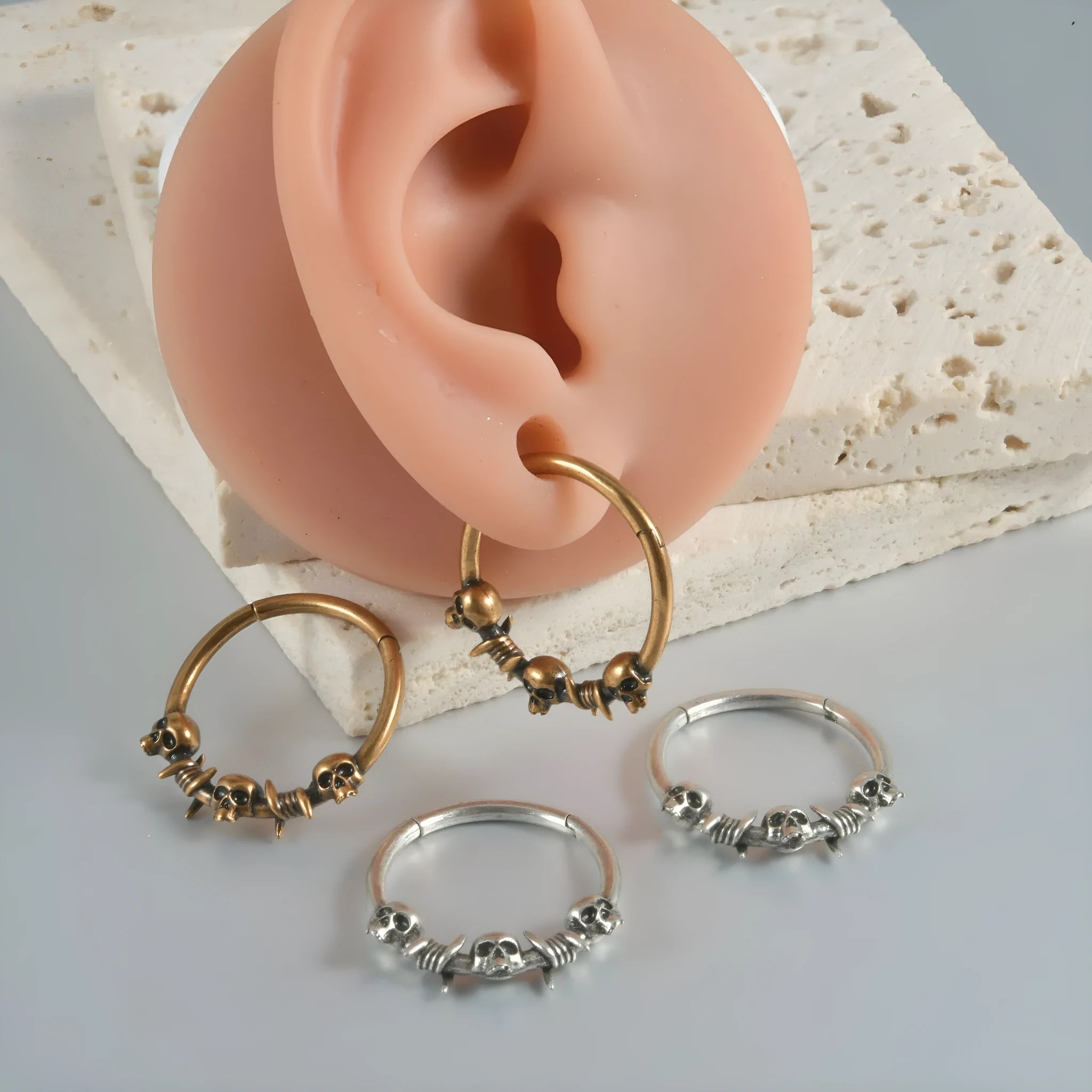 Copper punk earrings with ghost head design in antique silver or ancient gold colour