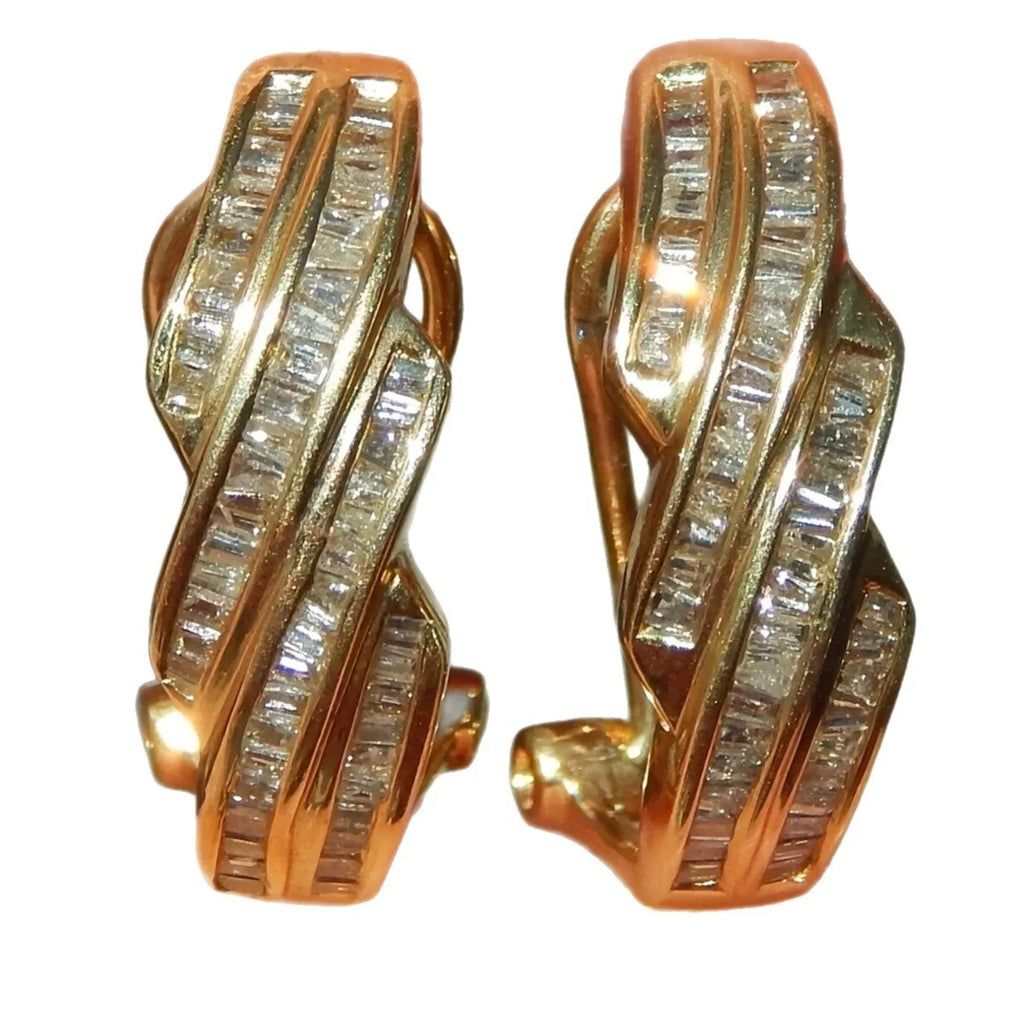 Gold geometric copper hoop earrings with circular retro elements on white background