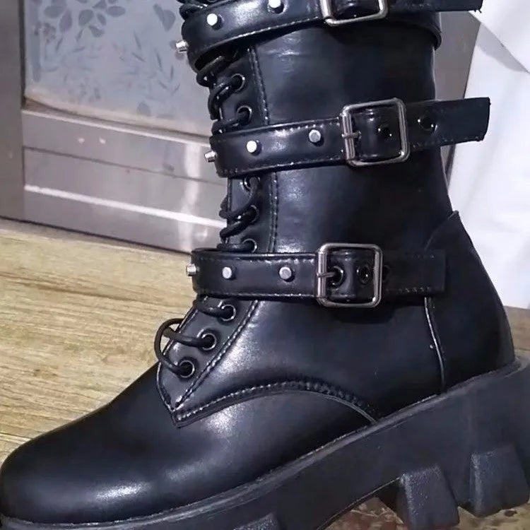 Black mid-calf women's knight boots with metal buckle and side zipper on a white background.